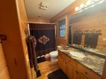 Main Floor Bathroom with a Tub / Shower Combo